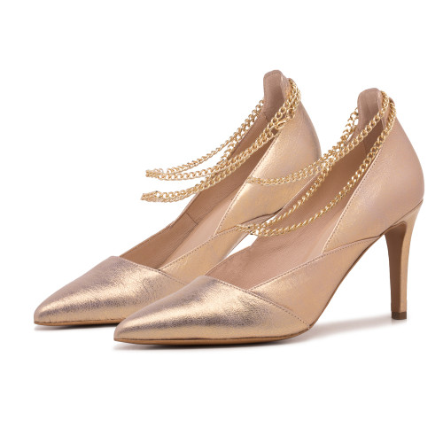 Beige shiny heels with jewelry